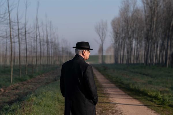 President of the Republic Mariano stands in a garden in La Grazia