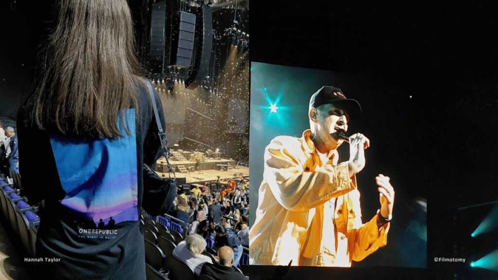 Hannah at the OneRepublic Concert and Ryan Tedder singing on stage - Filmotomy